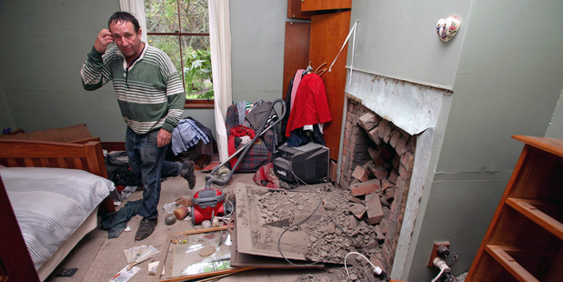 Doug Avery standing in his quake-damaged bedroom in Grassmere, near Seddon, yesterday. Photo / Tim Cuff