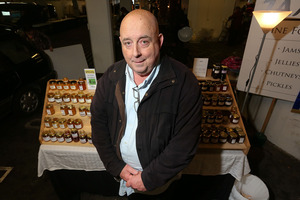 Graeme Cunningham with his jam stall at the Frank Kitts Park Underground Markets. Photo / Hagan Hopkins