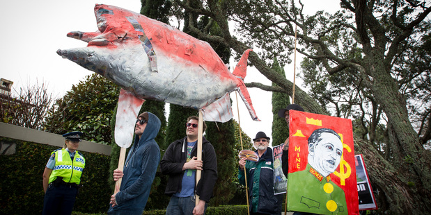 A small number of protesters marched to PM John Key's house in Parnell to protest the GCSB bill yesterday. Photo / Michael Craig