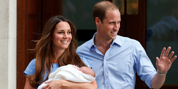 Prince William and Kate, Duchess of Cambridge with Prince George. Photo / AP