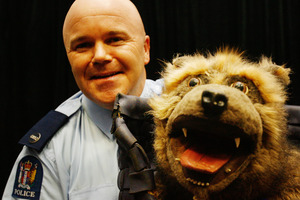 Senior constable Bryan Ward, with his "dog" Bobby, says filming the clip was a lot of fun. Photo / Greg Bowker