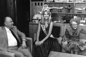 Lorraine Downes in her Miss Universe gown, with former Prime Minister Robert Muldoon and Dame Thea Muldoon. Photo / New Zealand Herald