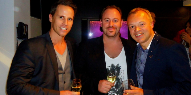 Invivo Wines' Tim Lightbourne and Rob Cameron share a drink with Graham Norton. Photo / Invivo Wines