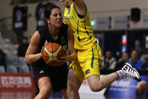 Natalie Hurst of Australia closes down Micaela Cocks in last night's clash. Photo / Getty Images