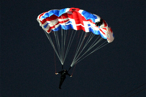 Mark Sutton parachuting into the Olympic opening ceremony. Photo / AP