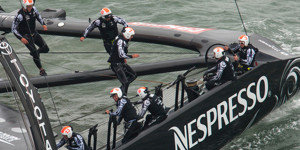 Each team has 11 crew members to control a boat which weighs six tonnes. Photo / Gilles Martin-Raget