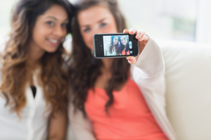 A mini tripod for your smart phone could come in handy. Photo / Thinkstock