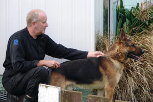 Gage and his handler Senior Constable Bruce Lamb