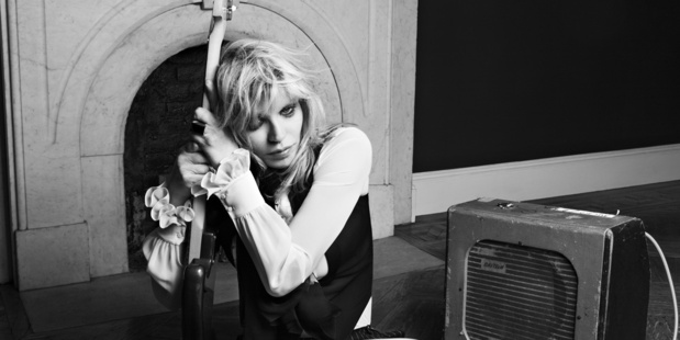 Designer and photographer Hedi Slimane captured 90s icon Courtney Love in the latest Saint Laurent campaign. Photo / YSL