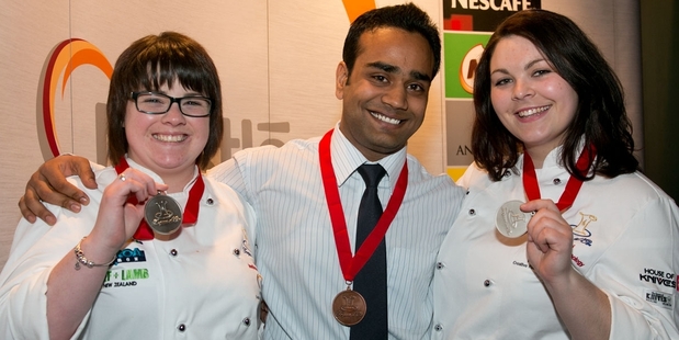 Waiariki Institute of Technology students Courtney Rigg (left), Chakraveer Singh and Dreena Leenstra brought home a silver and bronze medal at the Nestle Toque d'Or competition. Photo / Supplied