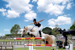 SOARING: Alycia Burton riding Goldrush easily clears this 1.7-metre-high fence without a saddle or bridle.PHOTO/SUPPLIED