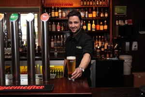 Joel Stanley is one of the friendly staff at The Backyard Bar. Photo / Doug Sherring