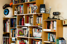 Bookshelf holding a collection of random things. Photo / Babiche Martens