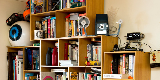 Bookshelf holding a collection of random things. Photo / Babiche Martens