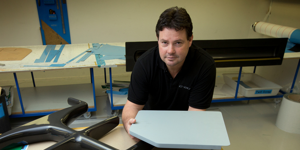 Paul Hackett - pictured with a carbon fibre dive ladder and a Boeing Dreamliner tray table will be in San Francisco this weekend, connecting with potential customers. Photo / Brett Phibb