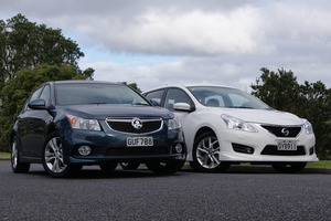 The Holden Cruze SRI hatchback takes on Nissan's icon Pulsar SSS. Photo / David Linklater