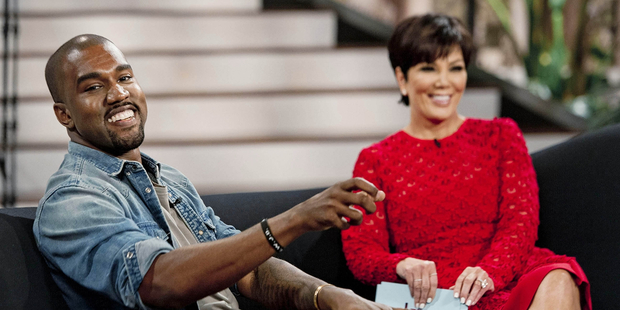 Kanye West, left, with host Kris Jenner during a taping of her talk show 'Kris' in Culver City, California. Photo / AP
