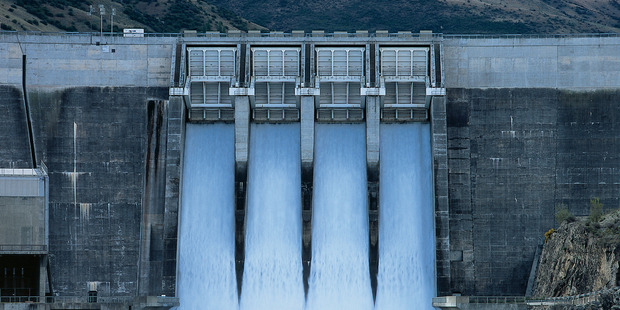 Contact Energy's Clyde Dam. The company, controlled by Australia's Origin Energy - has just reported good earnings and an increased dividend. Photo / NZ Herald