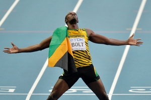 Usain Bolt wants to defend his Olympic titles in Rio. Photo / AP
