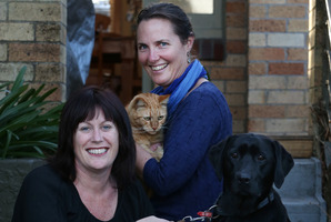 Kim Edwards with her cat Rory and Michelle Whitmore and her dog Maci.Photo / Joel Ford