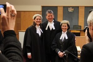 FAMILY LAW: Russell Fairbrother after being admitted to the Inner Bar yesterday, flanked by daughter Gretel (left) and wife Pam, also lawyers and both members of the Outer Bar. PHOTO/DUNCAN BROWN HBT133001-20