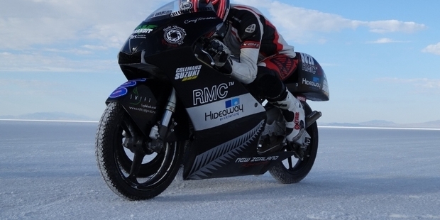 Kiwi Corey Bertelsen at the Salt Flats targeting land speed records with his 250cc bike and motorcycle with sidecar.