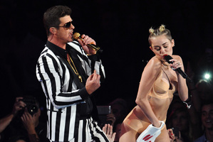 Robin Thicke, left, and Miley Cyrus perform at the MTV Video Music Awards. Photo / AP