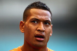 Code-hopping star Israel Folau is set to play for the Wallabies at the 2015 Rugby World Cup after signing a new two-year contract. Photo / Getty Images.