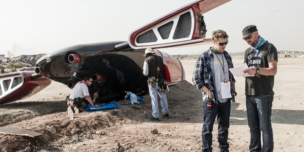 Kiwi Phil Ivey with director Neill Blomkamp on the set of hit film 'Elysium'. Photo / Stephanie Blomkamp