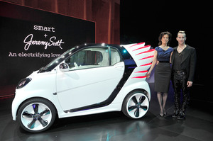 Dr Annette Winkler, head of Smart (left) with fashion designer Jeremy Scott unveiling the SmartForJeremy show car - a version of the new Smart Fortwo electric drive. Picture/Getty Images