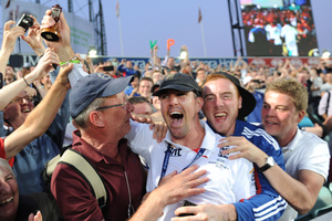 England's Kevin Pietersen is embraced as he clutches the replica Ashes urn. England won the series 3-0. Photo / AP
