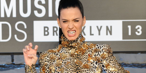 Katy Perry wore a grill that says 'ROAR' at the MTV Video Music Awards. Photo / AP