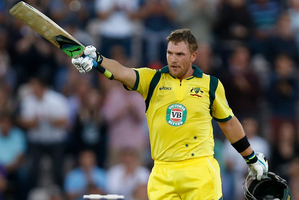 Australia's Aaron Finch celebrates getting a century, 100 runs, during their Twenty20 cricket match at The Ageas Bowl cricket ground in Southampton. Photo / AP