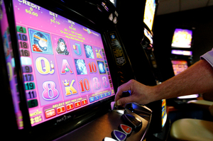 Payouts in 2013 have taken the total pokie money contribution to sports funding past the billion-dollar mark over the last seven years. Photo / Christine Cornege