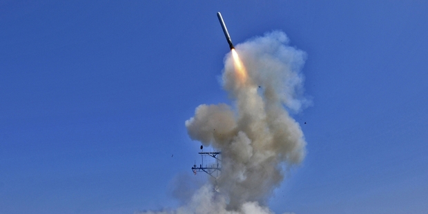 President Obama launched aerial strikes against Muammar Gaddafi's troops in Libya in March 2011. The US has four cruise missile-firing destroyers available in the Mediterranean. Photo / AP