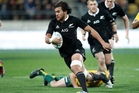 All Blacks flanker Steven Luatua leaves the Wallabies defence in his wake. Photo / Mark Mitchell All Blacks flanker Steven Luatua leaves the Wallabies defence in his wake. Photo / Mark Mitchell