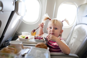 Air NZ says children are welcome in any cabin, but parents can sit in another class with their children travelling as unaccompanied minors. Photo / Getty Images