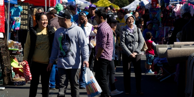 Saturday morning shopping at the busy Otara Markets reflects the diverse ethnic mix of the area's population. Photo / Richard Robinson