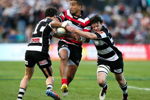 Rey Lee-Lo of Counties Manukau is tackled by Richard Buckman (R) and Zac Guildford of Hawke's Bay during the round four ITM Cup Ranfurly Shield match. Photo / Getty Images.