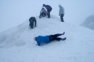 College kids get out amongst the snow after getting trapped on Mt Hutt. Photo / Georgie Boyd