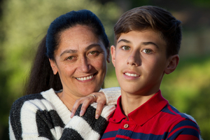 Priscilla Prime and her son Lewis Arthur, who was in a neck brace for three weeks. Photo / Richard Robinson