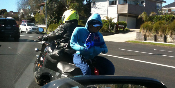 Thomas noticed this motorcyclist who had a clothed stuffed dummy strapped to the back of his bike. "Maybe it was to trick the transit lane rule?" he says.