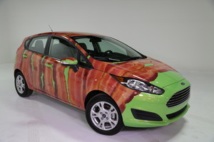 2014 Ford Fiesta dressed as bacon to mark International Bacon Day Aug. 31. Photo / Supplied