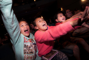 BIG FANS: Layla Lacey (left), Maddison MacFarlane, both 11 and Kiarni MacFarlane, 6, were first in the queue to see Stan Walker yesterday. Photo / BEN FRASER 030913BF10