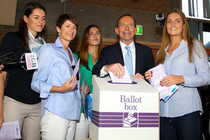 Tony Abbott casts his vote with his Kiwi wife Margie and their daughters Bridget, Frances and Louise. Photo / Getty Images