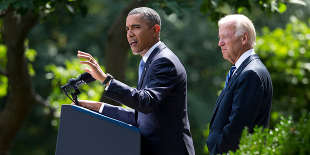 President Barack Obama, with Vice-President Joe Biden, has asked Congress to back his plans. Photo / AP