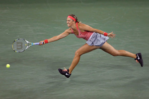 Victoria Azarenka, of Belarus, returns a shot to Daniela Hantuchova, of Slovakia, during a quarterfinal of the U.S. Open tennis tournament. Azarenka won 6-2, 6-3. Photo / AP.