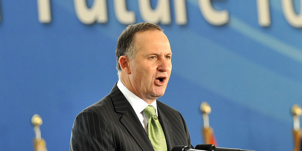 The Right Honourable John Key has a right honourable papal hairdo. Photo / AP
