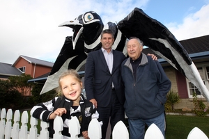 HAWKEYE CREW: Simon Tremain, who sparked the Hawkeye facelift, and Mela, his daughter (a Magpies fan) and Ian Mills, who designed the big bird 48 years ago. PHOTO/PAUL TAYLOR HBT132758-01