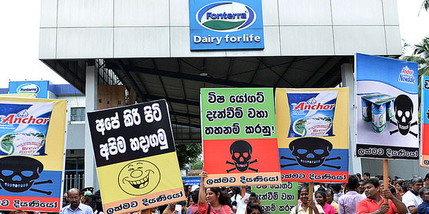 Activists demonstrating outside the Sri Lankan headquarters of New Zealand dairy giant Fonterra. Photo / AFP